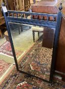 A late Victorian ebonised wall mirror, width 63cm height 110cm