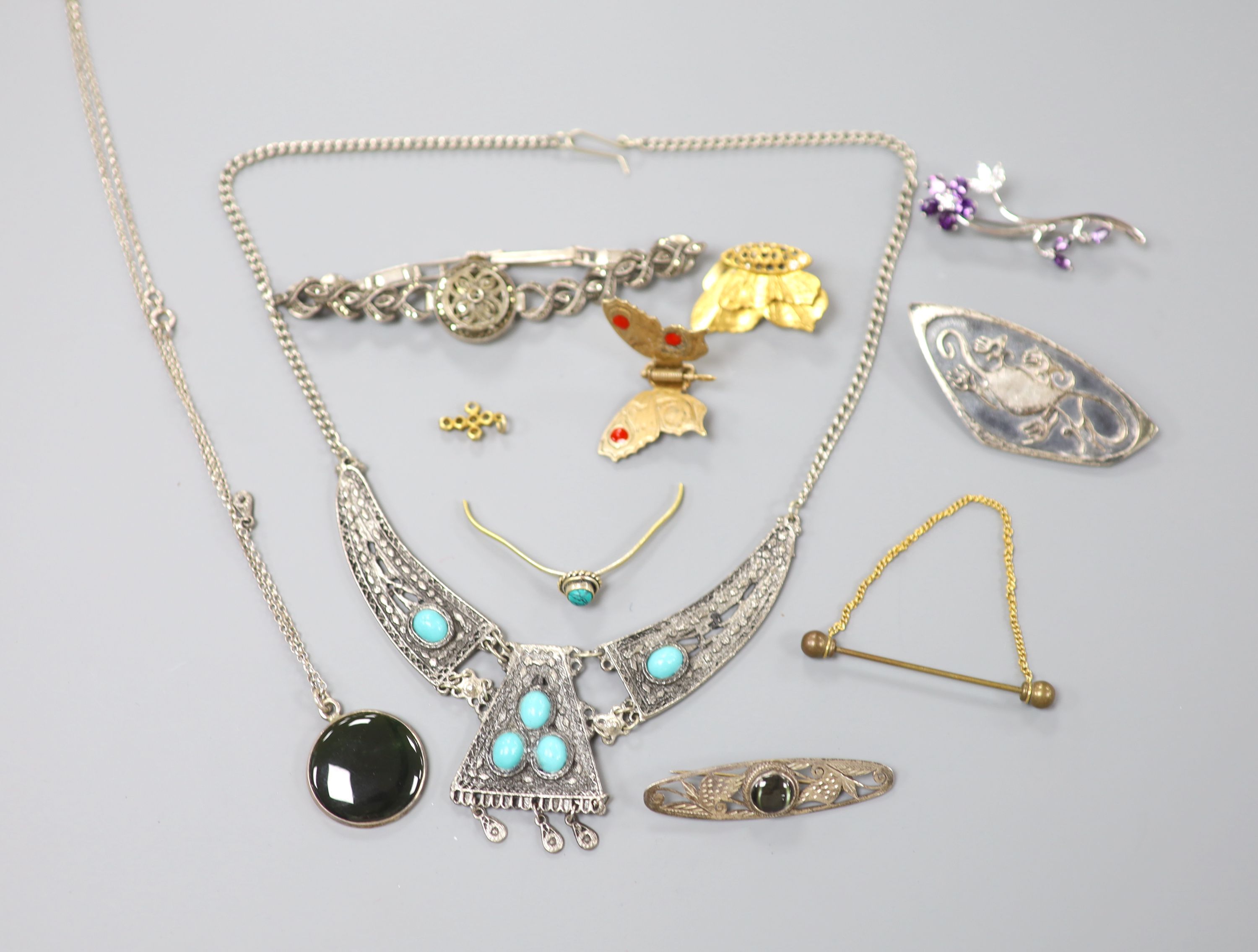 A lady's sterling and marcasite set manual wind wrist watch and other minor jewellery.