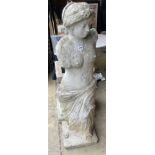 A reconstituted stone garden ornament of Venus on pedestal base, height 192cmCONDITION: The head has