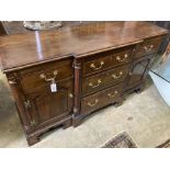 An 18th century style oak breakfront low dresser base, width 148cm, depth 47cm, height 83cm