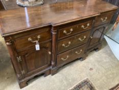 An 18th century style oak breakfront low dresser base, width 148cm, depth 47cm, height 83cm