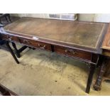 A George III style mahogany three drawer writing table, width 150cm, depth 61cm, height 77cm