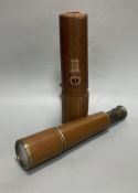 A Broadhurst & Clarkson brass three drawer telescope