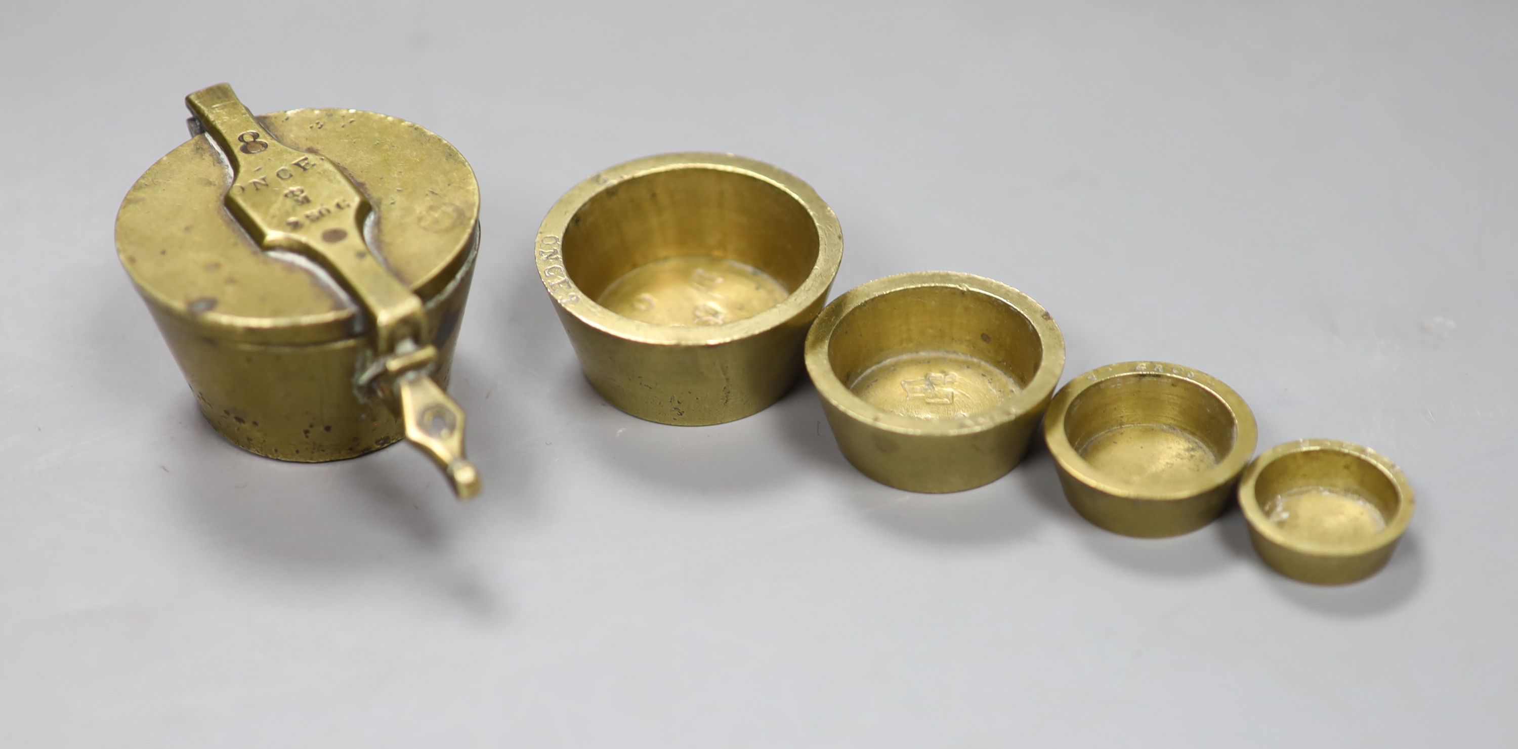 A Victorian brass 8 ounce cup weights - Image 2 of 3