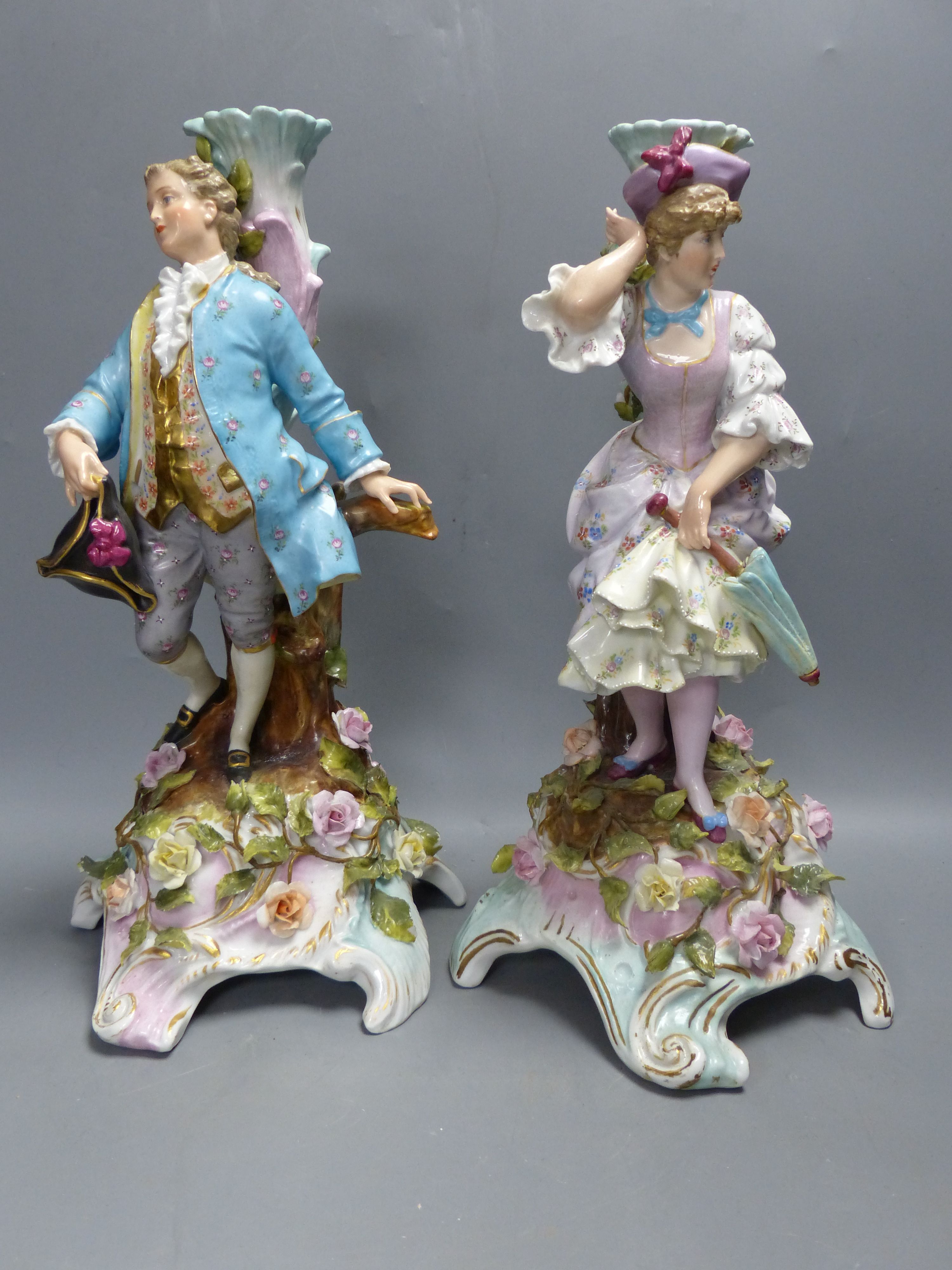 A pair of early 20th century Plaue porcelain figural candelabra, overall height 48cmCONDITION: - Image 11 of 17