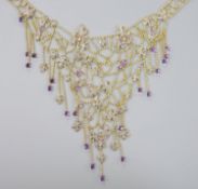 A 20th century yellow metal, amethyst and diamond chip set drop fringe necklace, set with marquise