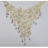 A 20th century yellow metal, amethyst and diamond chip set drop fringe necklace, set with marquise