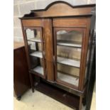 An Edwardian inlaid mahogany display cabinet, width 120cm, depth 35cm, height 175cm