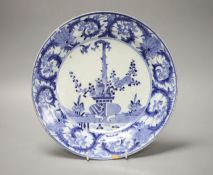 An 18th century Japanese Arita blue and white plate, spurs marks, diameter 26cmCONDITION: Repaired