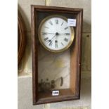 A Brillie oak and marble electric wall clock