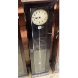 A Pul-Syn-Etic Impulse electric master clock in a beech case, with label for date and manufacture,