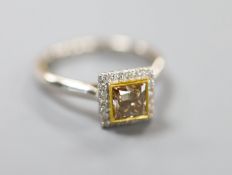 A modern platinum and single stone square modified brilliant cut natural dark yellowish brown