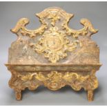 An 18th century Spanish carved and gilded book stand, width 42cm height 37cm