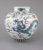 A Chinese doucai 'dragon' jar and cover, Qianlong seal mark, late 19th/early 20th century, the ovoid