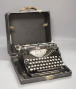 An early 20th century Underwood Elliott Fisher Ltd portable cased typewriter