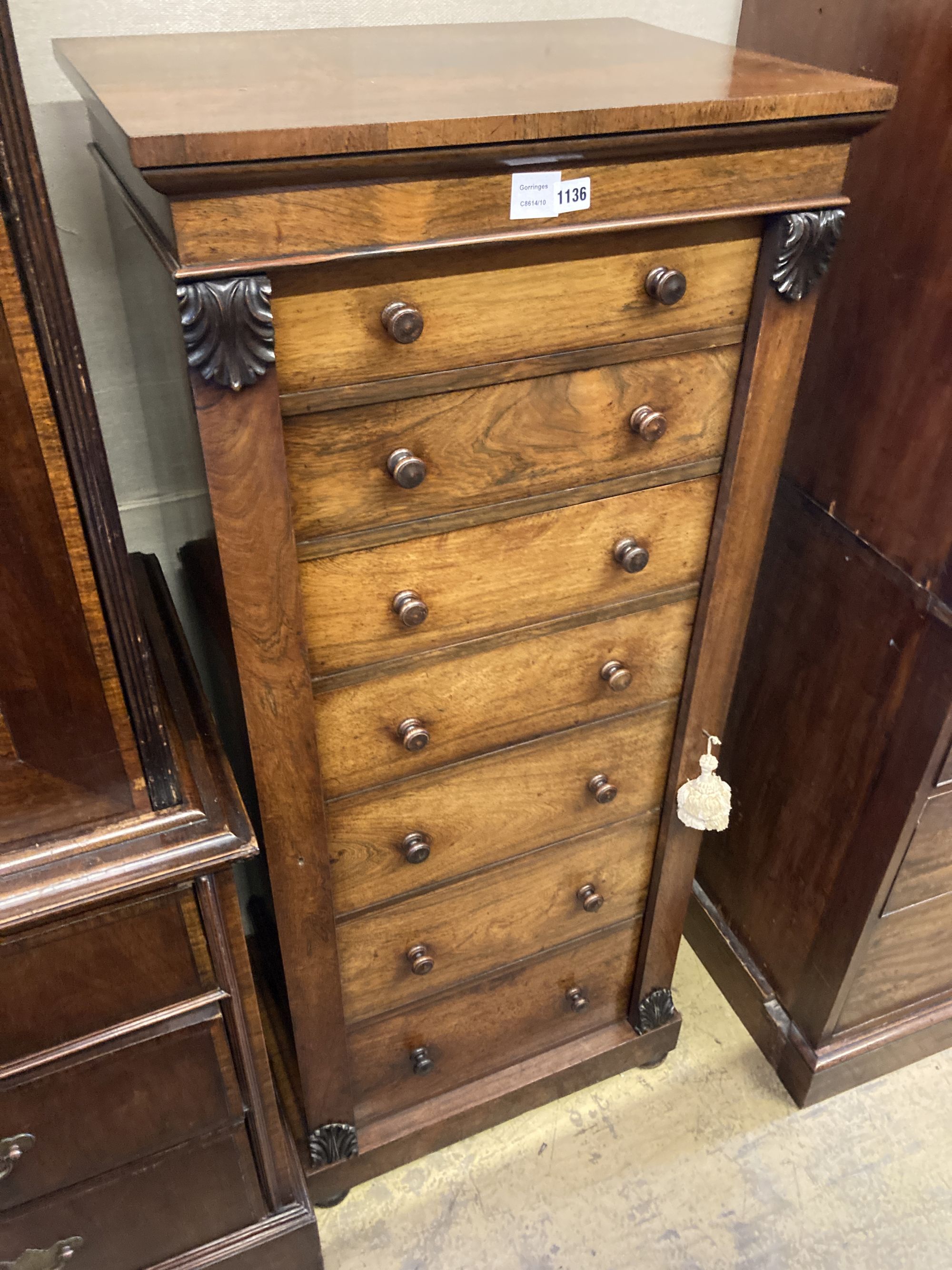 A Victorian rosewood Wellington chest, width 60cm depth 43cm height 140cm