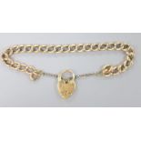 A 9ct gold curblink bracelet, with heart shaped padlock clasp, approx. 17cm, gross 9.5 grams.