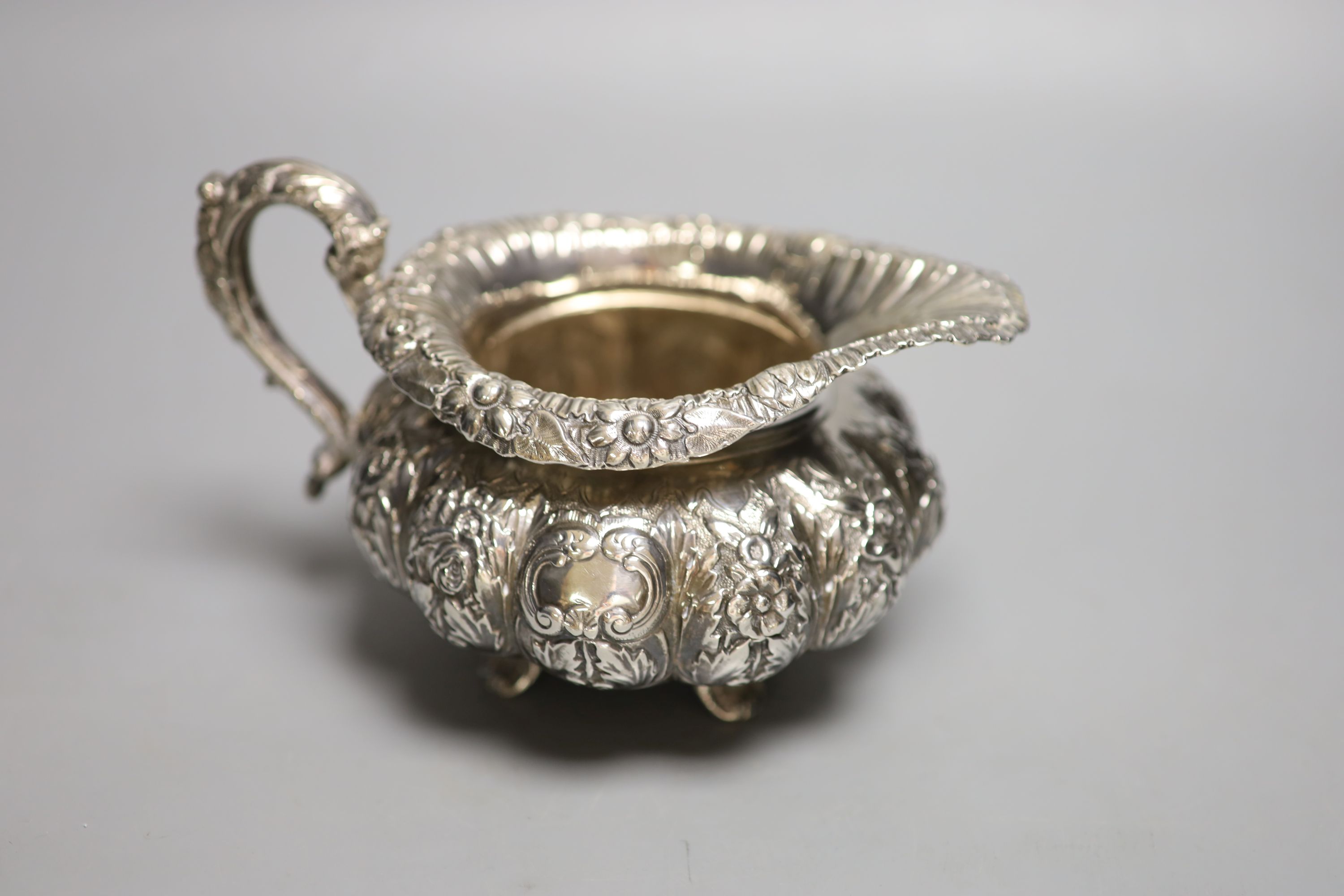 A George IV Irish silver squat melon shaped cream jug, James Le Bas, Dublin, 1828, height 11.2cm,