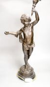 A spelter 'cherub' lamp with flame shade, height 89cm