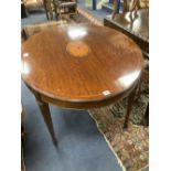 An Edwardian satinwood banded mahogany oval topped centre table, width 106cm, depth 90cm, height