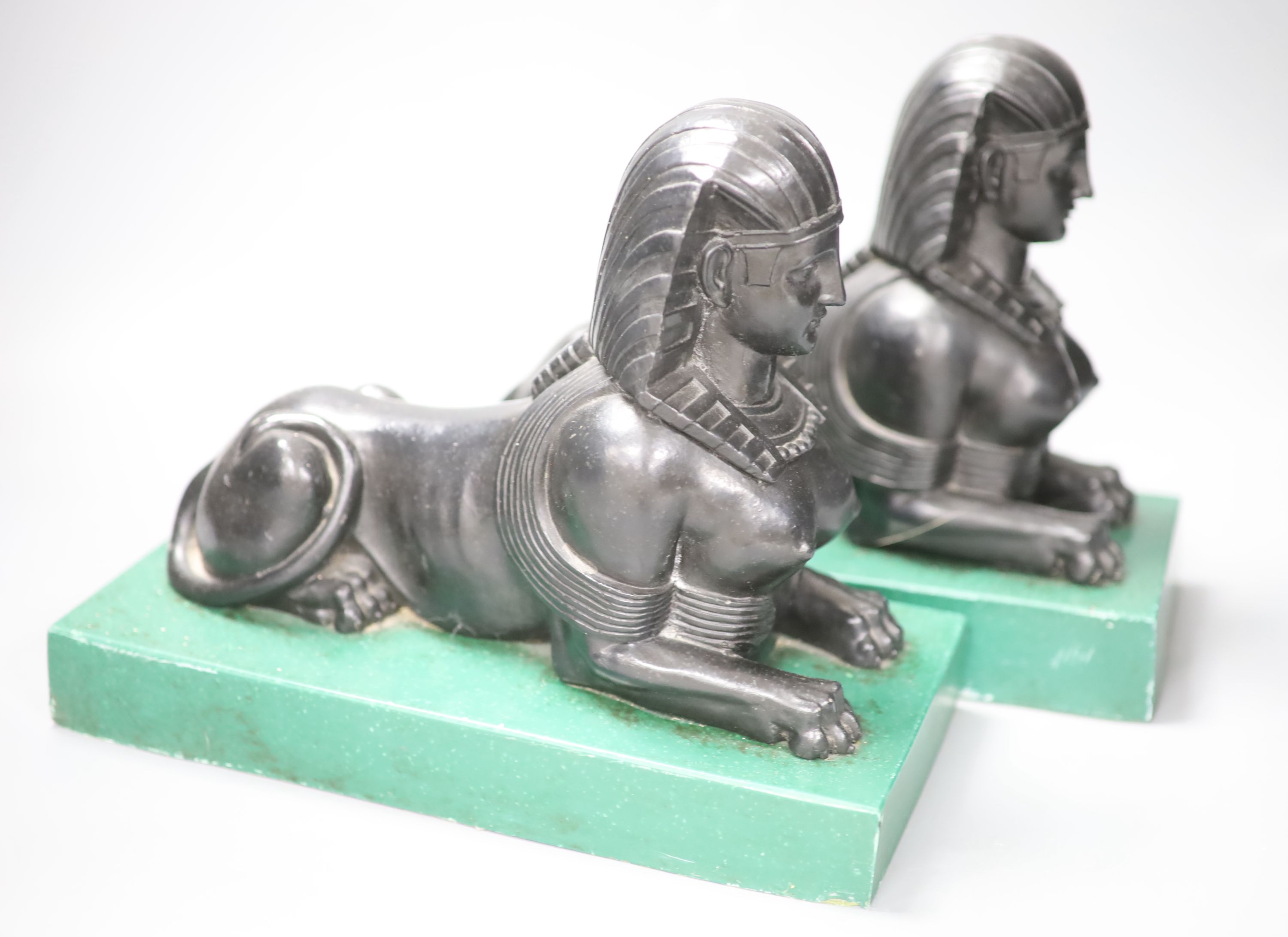 A pair of Egyptianesque composition bookends, each modelled as a Sphinx, width 28cm height 23cm - Image 2 of 3