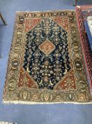 A North West Persian blue ground rug, 164 x 118cm