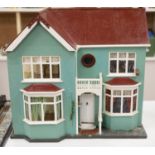 A 1940's doll's house, with contents from Compton Verney Warwickshire, width 63cm height 60cm