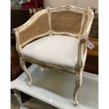 A Louis XVI style painted caned tub framed chair, width 62cm, depth 50cm, height 80cm