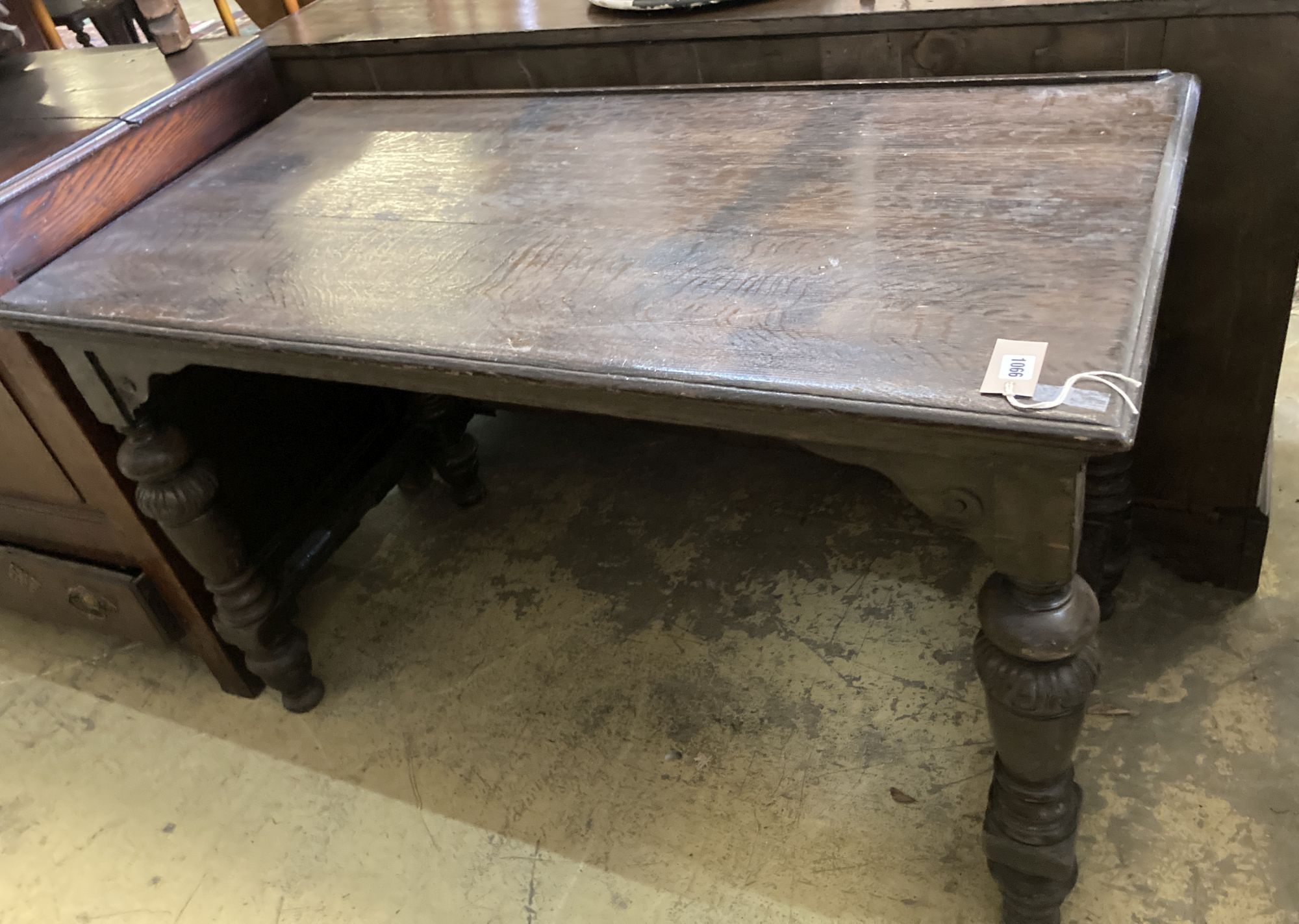 A rectangular oak side table, width 121cm, depth 60cm, height 76cm