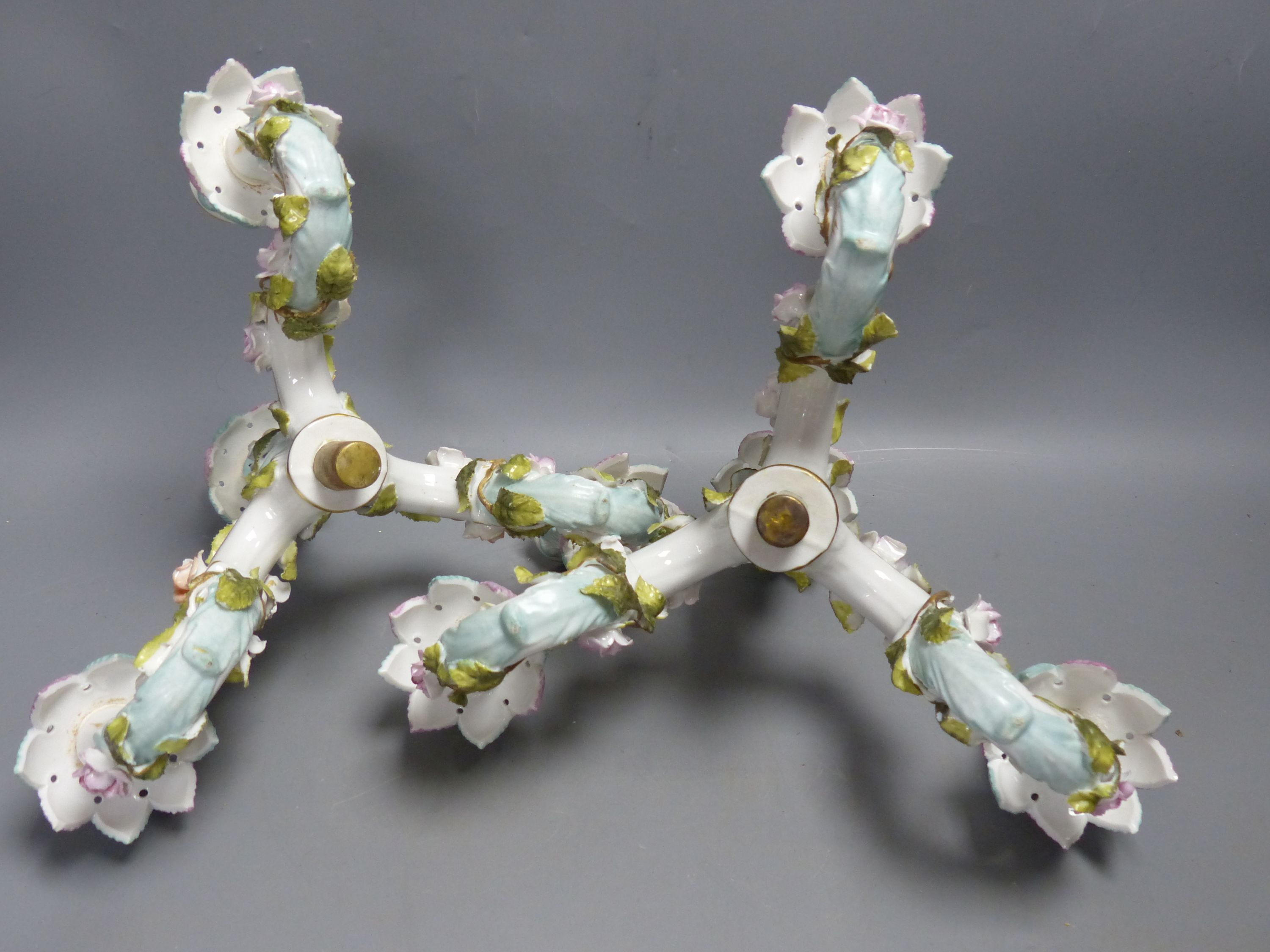 A pair of early 20th century Plaue porcelain figural candelabra, overall height 48cmCONDITION: - Image 16 of 17