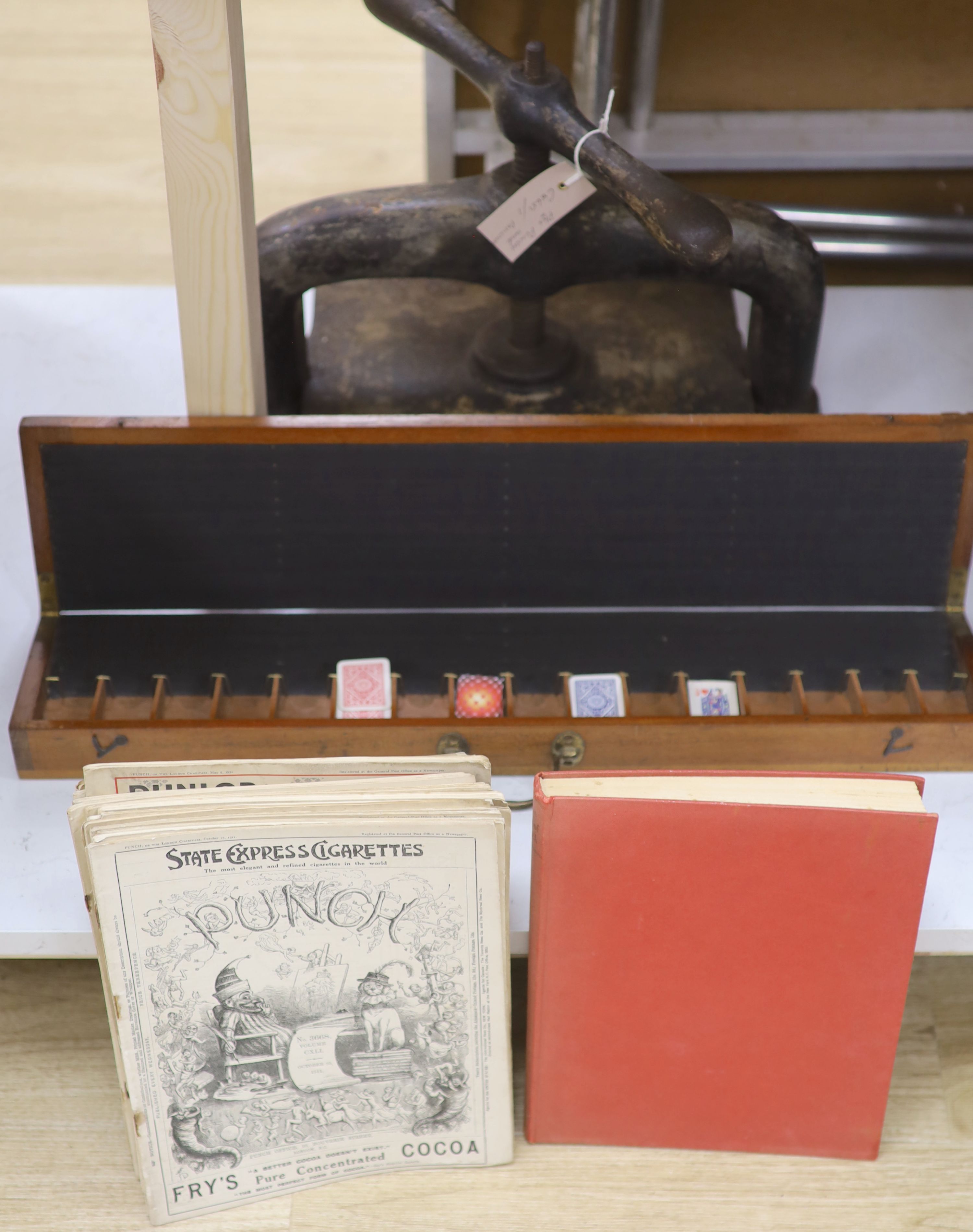 A book binder's cast iron press, various Punch publications, a Jacques mahogany patience box