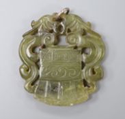 A Chinese carved bowenite pendant, 54mm.