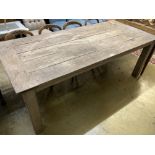 A large rectangular weathered teak garden table, width 220cm, depth 99cm, height 79cm