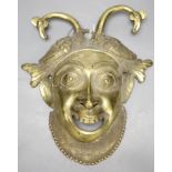 A gilt bronze wall mask, height 33cm