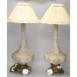 A pair of 19th century French gilt floral decorated frosted glass vases, fitted as table lamps,