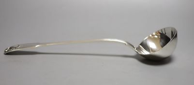 A Victorian silver fiddle, thread and shell pattern sauce ladle, Elizabeth Eaton, London, 1855, 33.