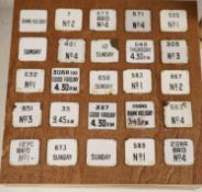 Postal History: A collection of 100 next post enamelled tabs, pre-war, mounted on 4 display boards