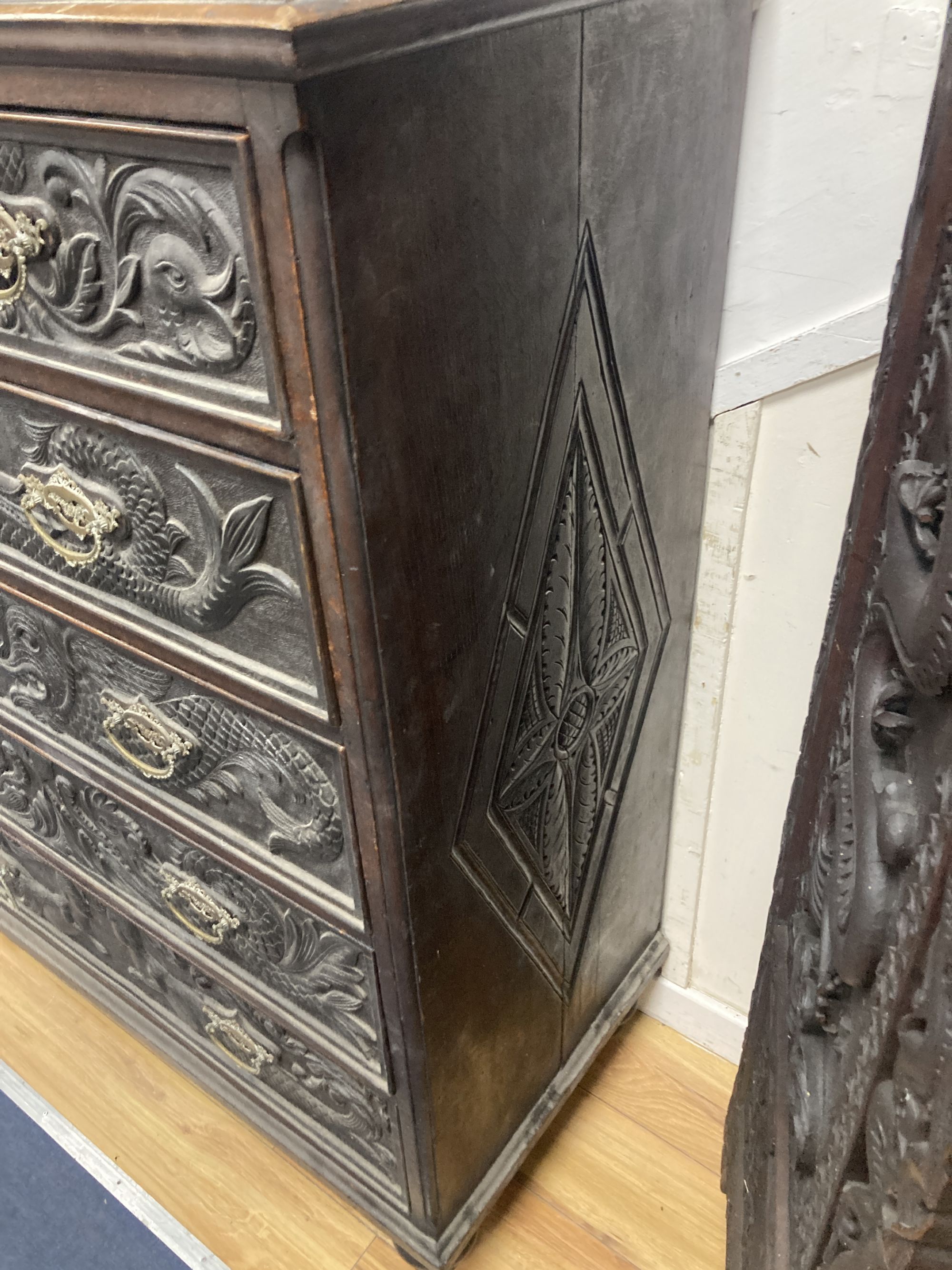 A 19th century oak chest with later carved decoration, width 106cm, depth 50cm, height 135cm - Image 3 of 4