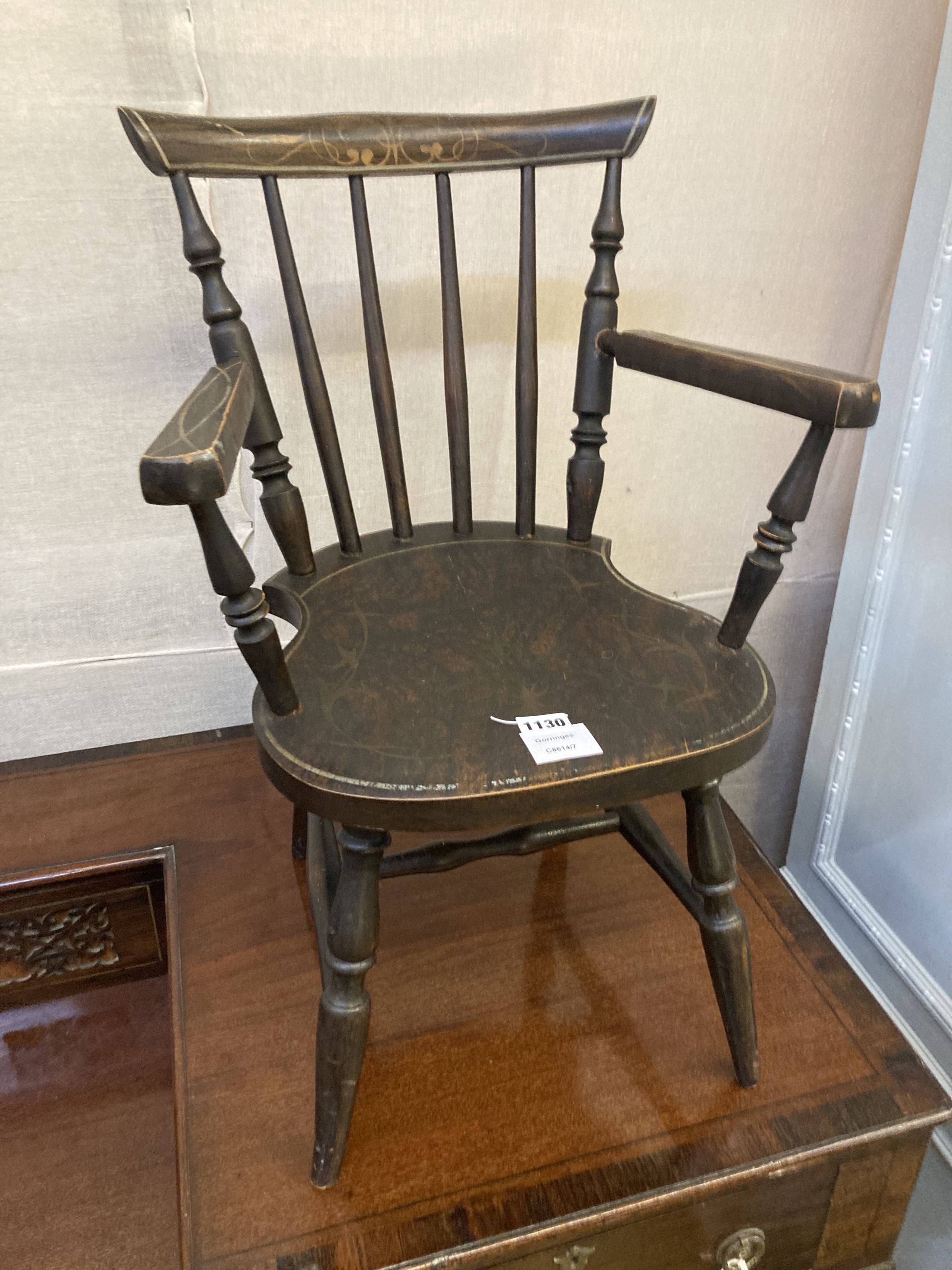 A child's Windsor comb back chair, width 42cm depth 35cm height 62cm