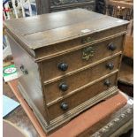 A Queen Anne oak commode, with dummy drawer front, width 46cm, depth 39cm, height 43cm