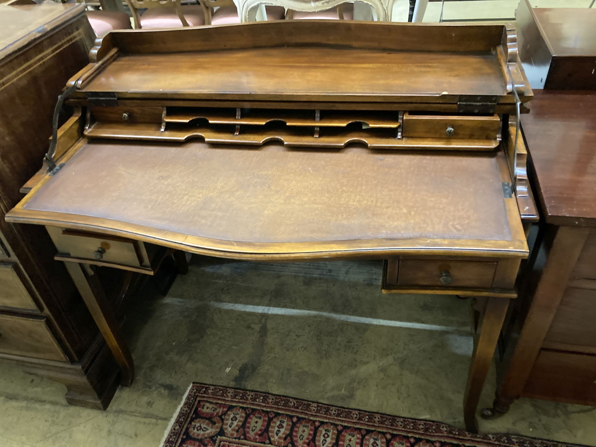 A reproduction mahogany serpentine front writing table, width 106cm depth 57cm height 84cm - Image 3 of 3