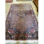 A North West Persian peach ground carpet, 260 x 156cm