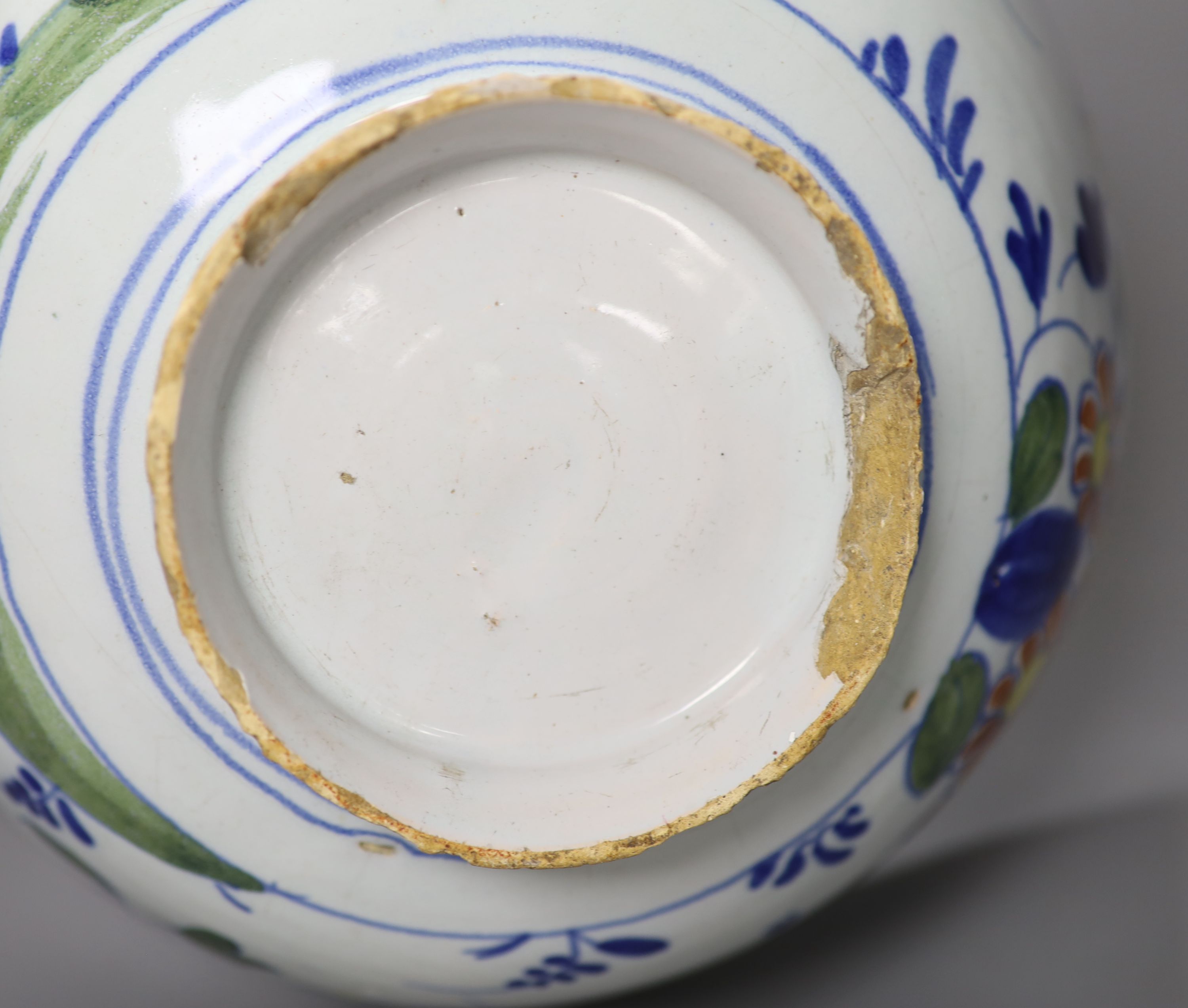 An 18th century English Delft punch bowl, diameter 26cmCONDITION: Bowl - obvious damage includes - Image 5 of 5