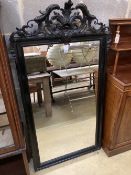 A 19th century French ebonised wall mirror, width 86cm, height 158cm