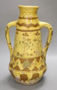 A Continental brown and cream slip decorated two handled vase, height 46cm (a.f.)CONDITION: