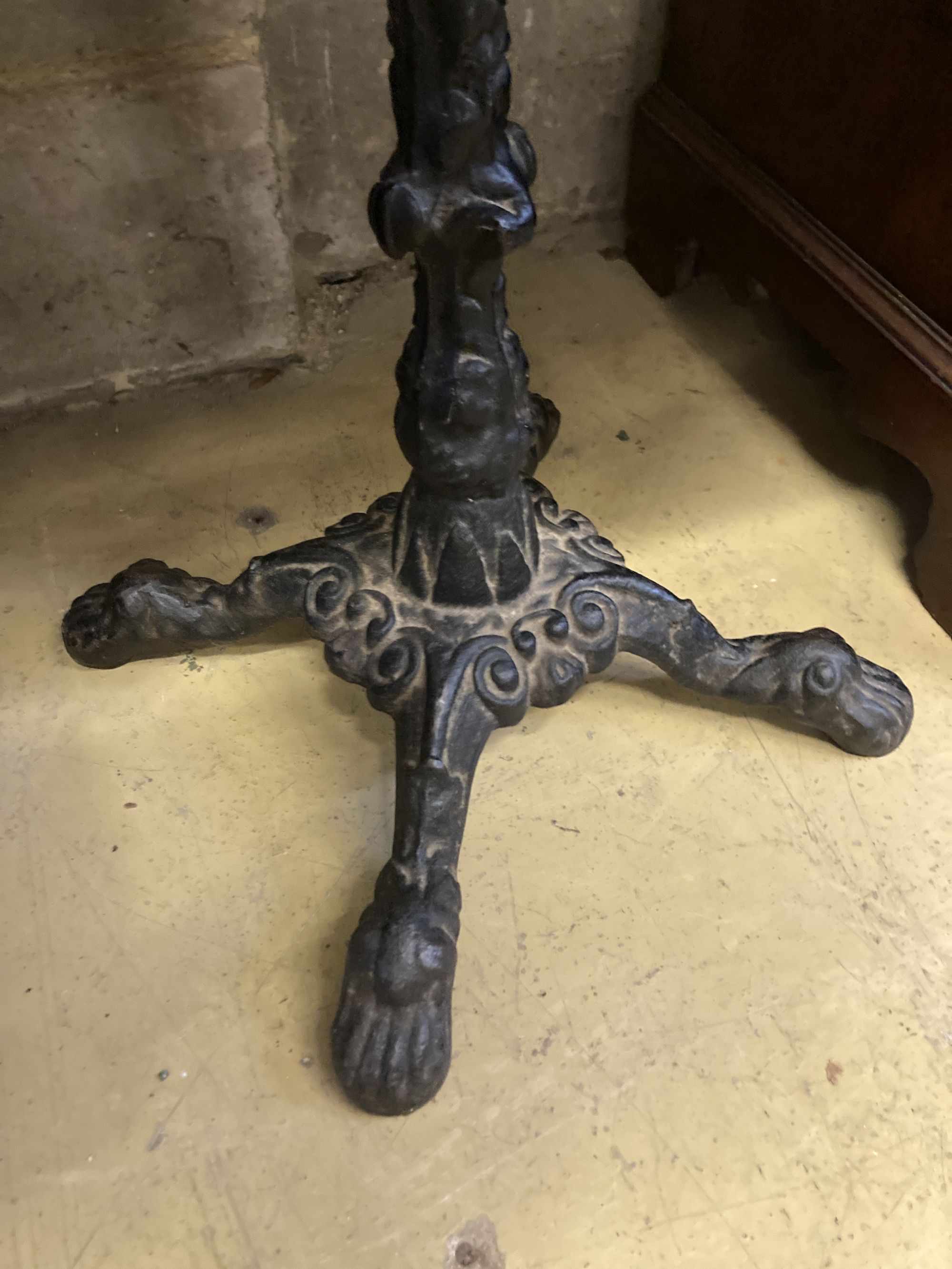 A Victorian style cast iron circular mahogany topped table, 58cm diameter, height 72cm - Image 3 of 3