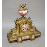 A 19th century French gilt metal and porcelain inset mantel clock, height 37cm