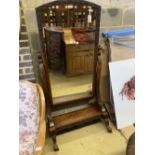 A Victorian carved flame mahogany cheval mirror, width 80cm, height 168cm