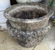 A reconstituted stone garden planter, 52cm diameter, height 40cm