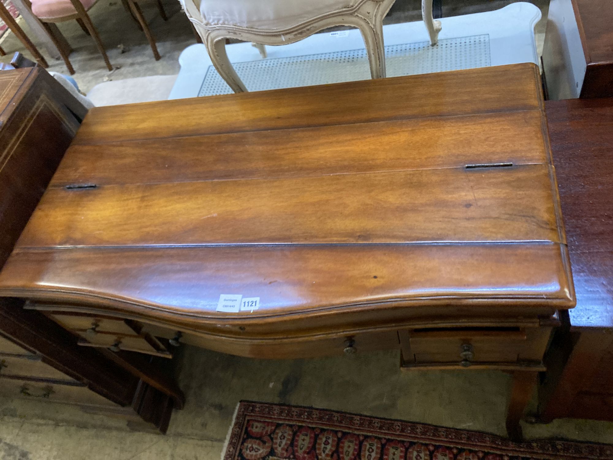 A reproduction mahogany serpentine front writing table, width 106cm depth 57cm height 84cm - Image 2 of 3